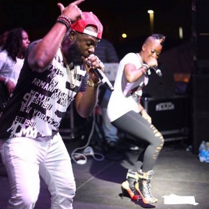 Fay Ann Lyons, alongside her husband and musical partner, Bunji Garlin performing at Rave in Miami. 