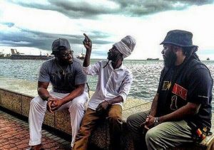 On Friday, outside of the Hyatt Regency Hotel in Port-of-Spain, Sizzla had a moment with Gramps and Peetah Morgan of Morgan Heritage. 