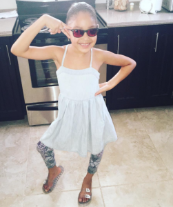 Xaiya's being paid in USD for her in house assistant services. 